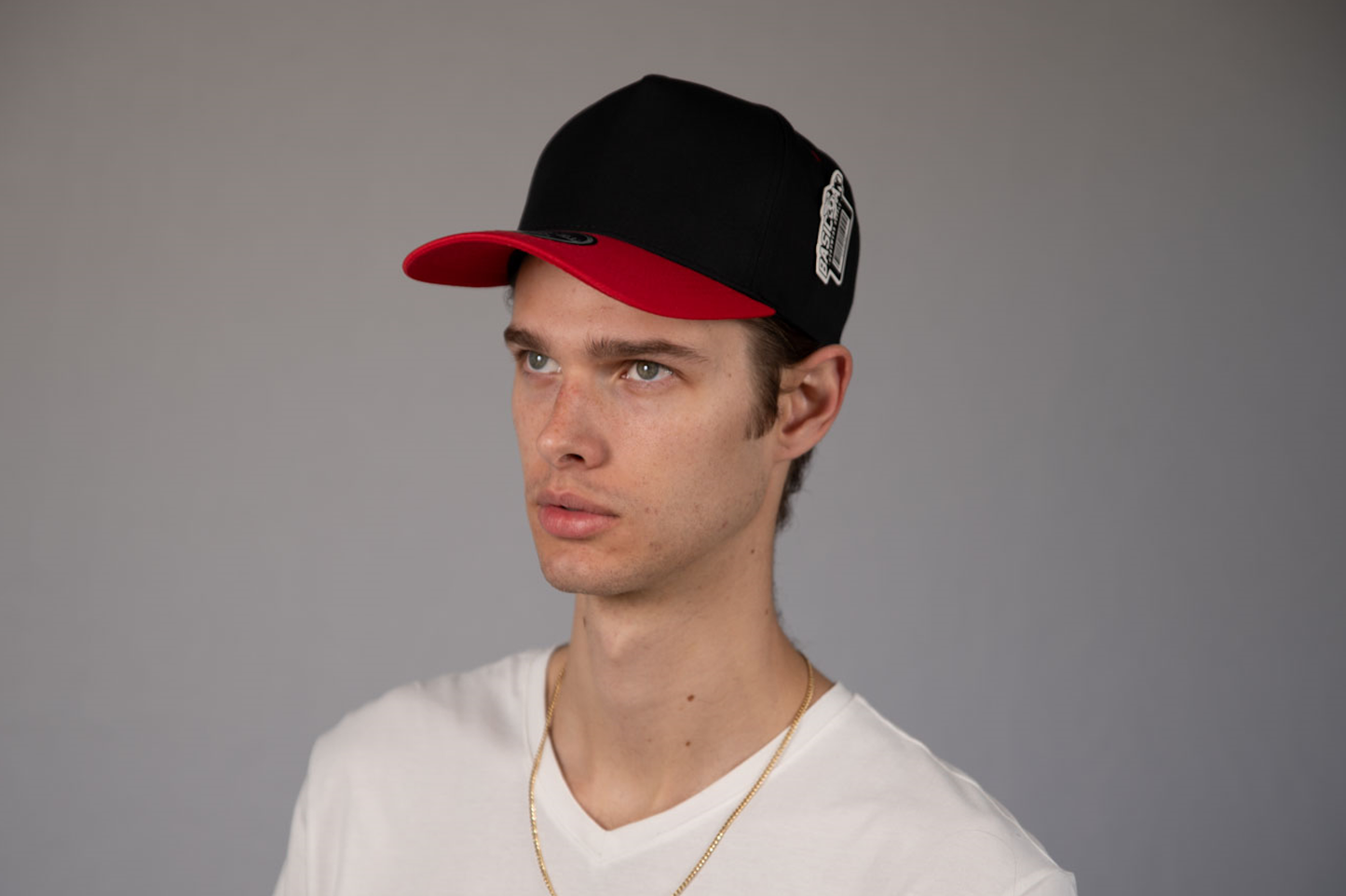 5-Panel Snapback (Curved Bill) — Black / Red Bill — Dozen Pack