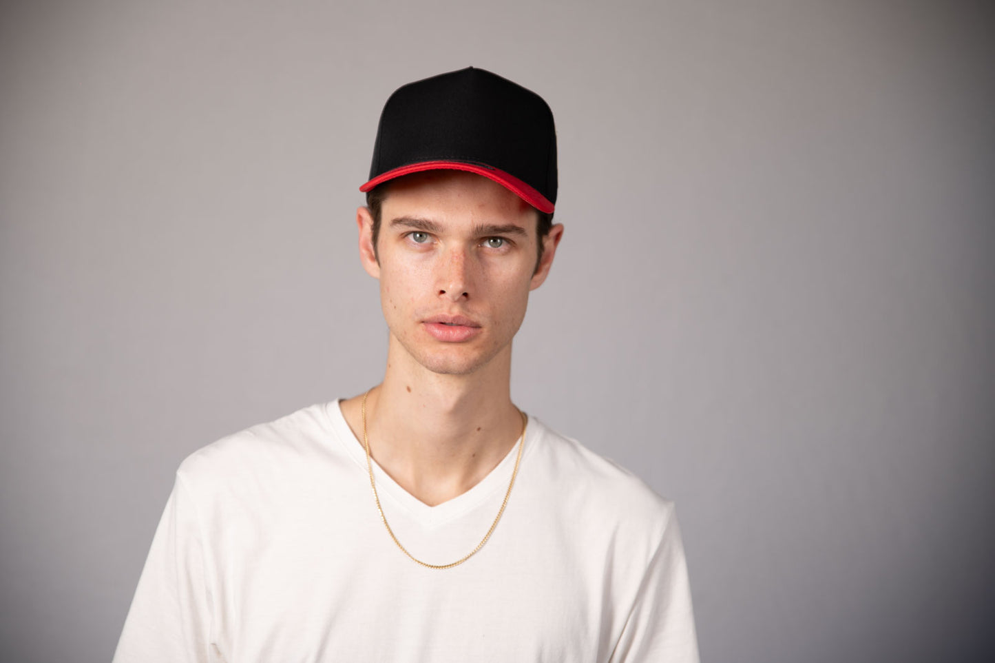 5-Panel Snapback (Curved Bill) — Black / Red Bill — Dozen Pack