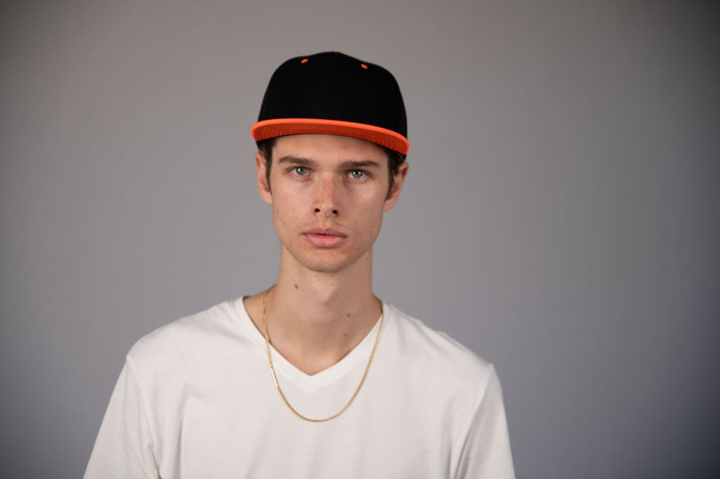 6-Panel Snapback (Flat Bill) — Black / Orange Bill — Dozen Pack